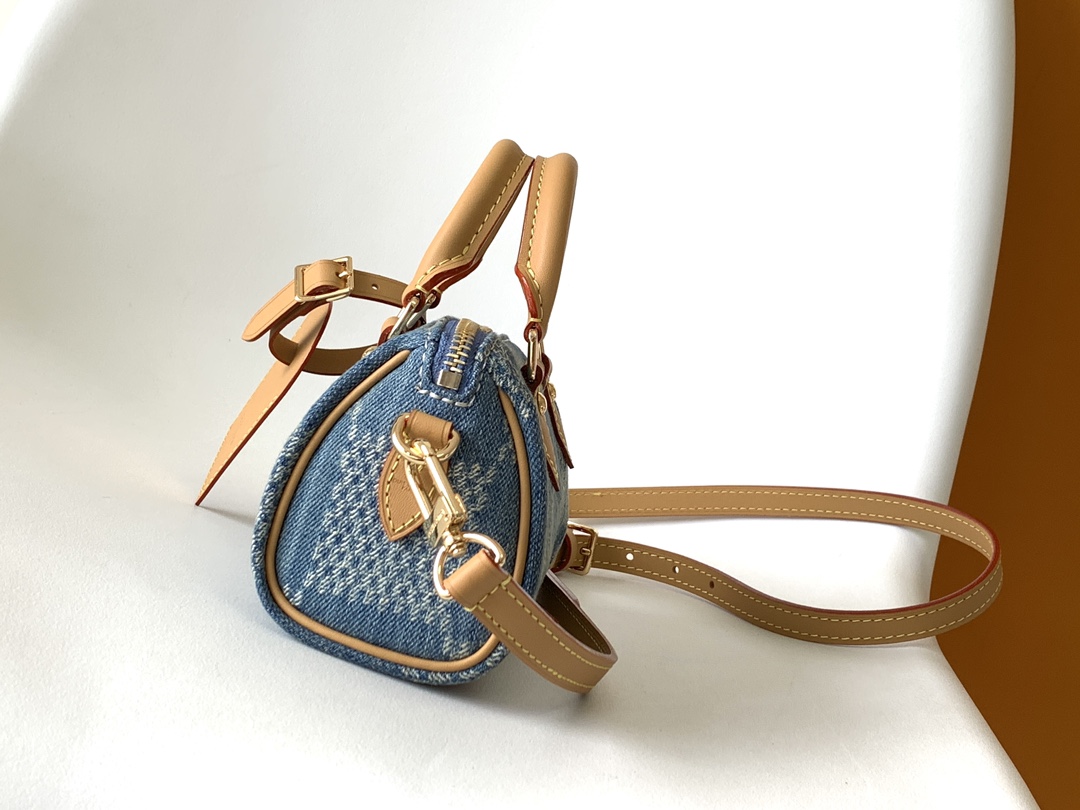 1 Louis Vuitton N40682 — FW New Denim Collection. The Sunset bag takes center stage in Monogram Denim canvas.