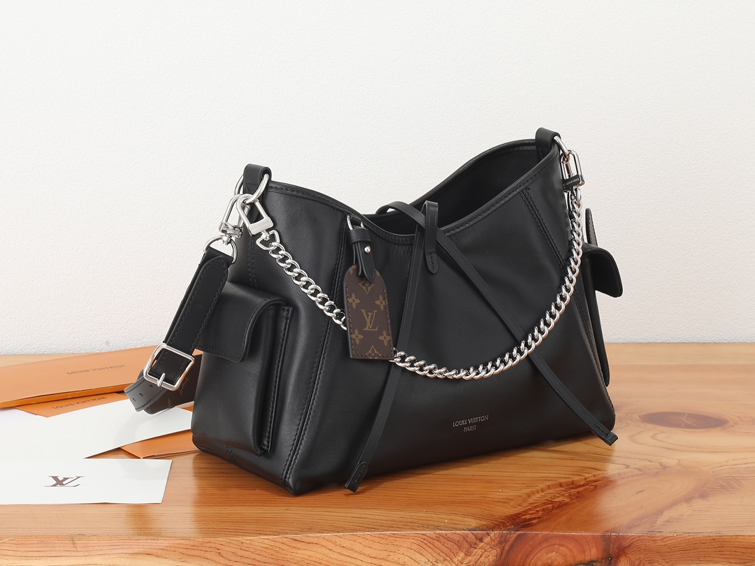 1 Louis Vuitton This small CarryAll Cargo handbag is crafted from soft lambskin, featuring a stylishly micro-crinkled finish.