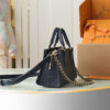 1 Louis Vuitton M23640 Deep Blue Embossed: This small OnTheGo handbag is crafted from Monogram Empreinte leather, embossed with the Giant Monogram pattern.