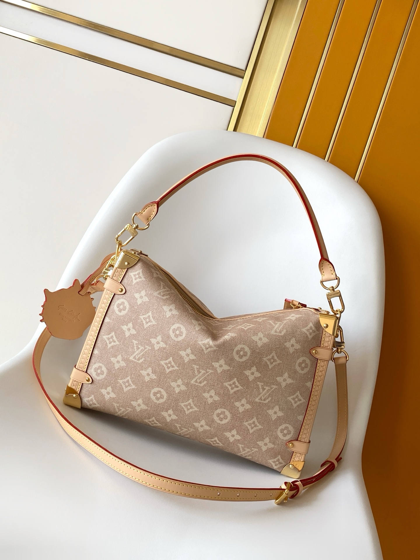 2 Louis Vuitton This "LV Travels With" edition of the large Side Trunk handbag showcases the brand's collaboration with a fashion icon and artist.