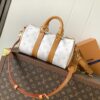 2 Louis Vuitton KEEALL BANDOULIÈRE 25 Handbag