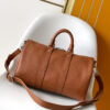 2 Louis Vuitton Keepall Bandoulière 35 Bag — This practical and versatile Keepall Bandoulière