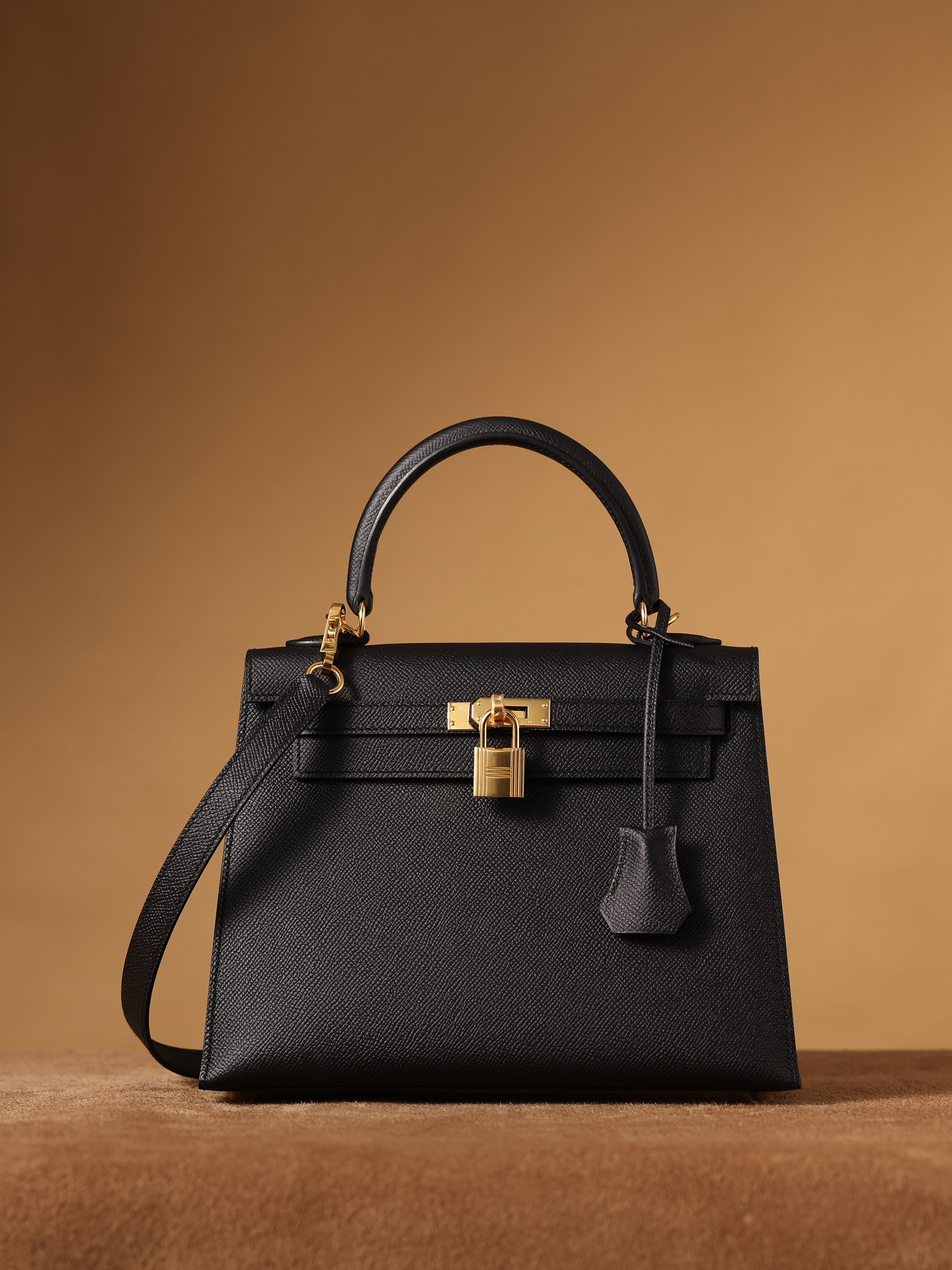 2 Hermes Kelly bag, black, 25cm, with gold hardware.