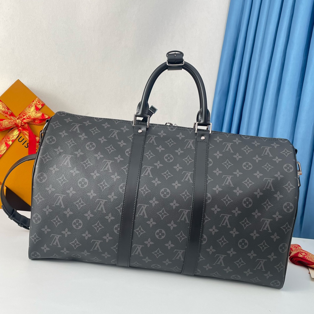 2 Louis Vuitton The Keepall 50 travel bag, crafted from the new, iconic black and grey Monogram Eclipse canvas.