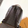 2 Louis Vuitton This Discovery Small Backpack features Monogram canvas accented with Monogram Reverse and Damier canvas patches.