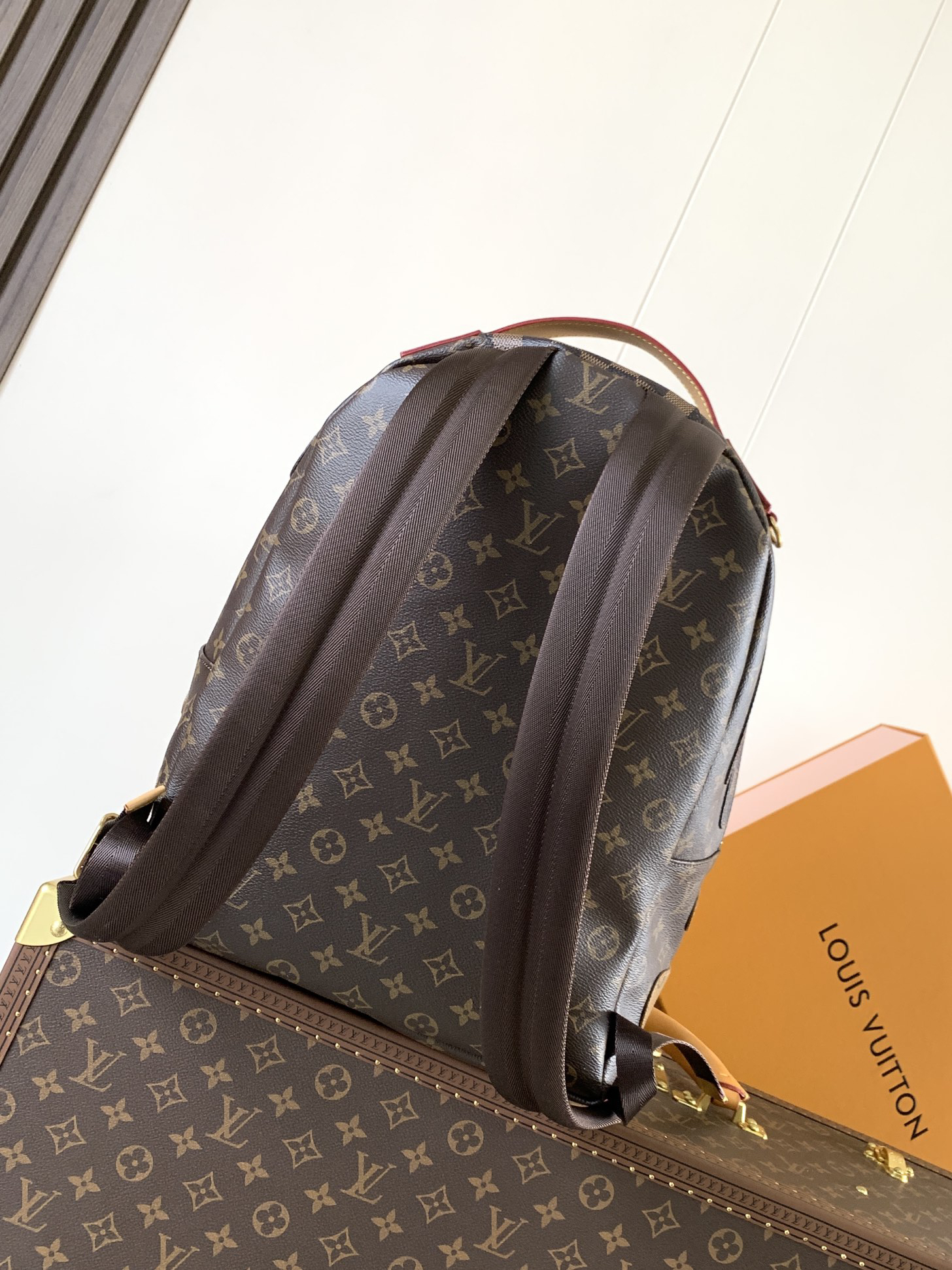 2 Louis Vuitton This Discovery Small Backpack features Monogram canvas accented with Monogram Reverse and Damier canvas patches.