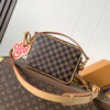 2 Louis Vuitton This Nil messenger bag features a Monogram canvas body accented with Damier and Monogram Reverse canvas patches, creating an elegant patchwork effect.