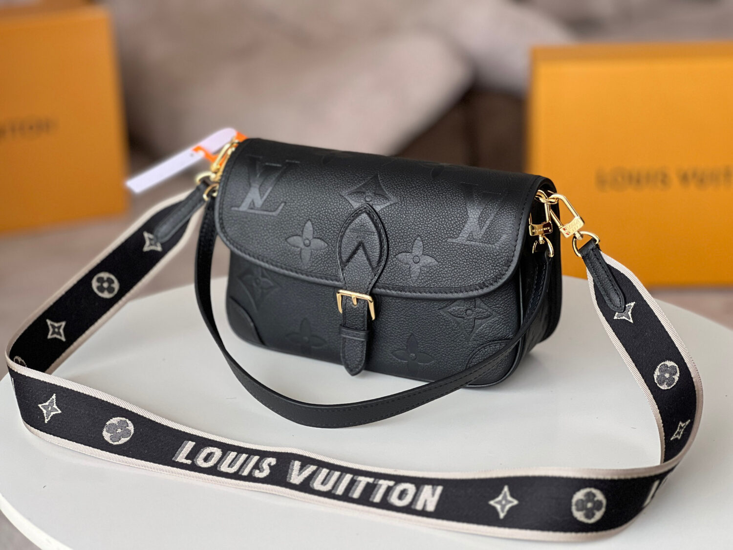 2 Louis Vuitton This Diane handbag is crafted from Louis Vuitton's classic Monogram Empreinte embossed leather.