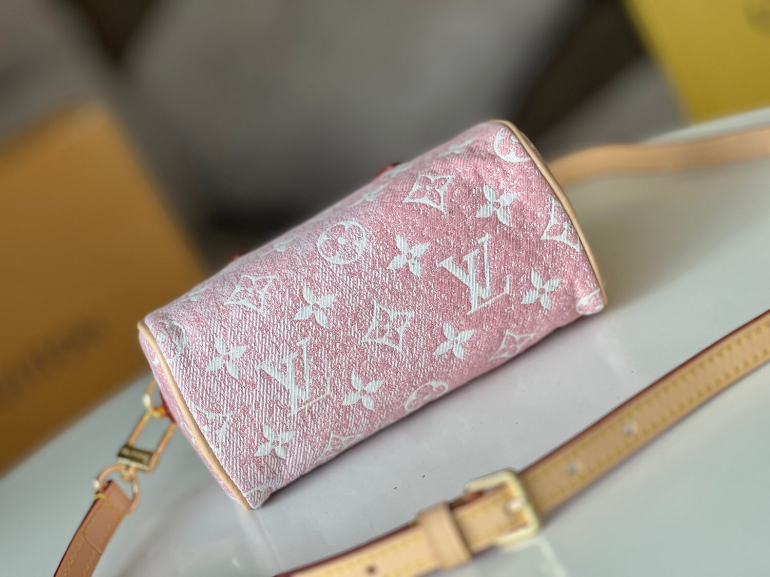 2 Louis Vuitton The Nano Speedy handbag crafted from classic Monogram canvas.