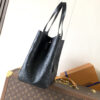 2 Louis Vuitton True to its name, this medium-sized "All In One" handbag is designed to be versatile, effortlessly transforming into either a tote or a Hobo bag.