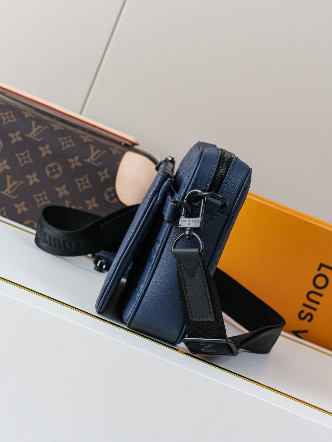 2 Louis Vuitton This Trio Messenger bag is crafted from soft Monogram Shadow calf leather.