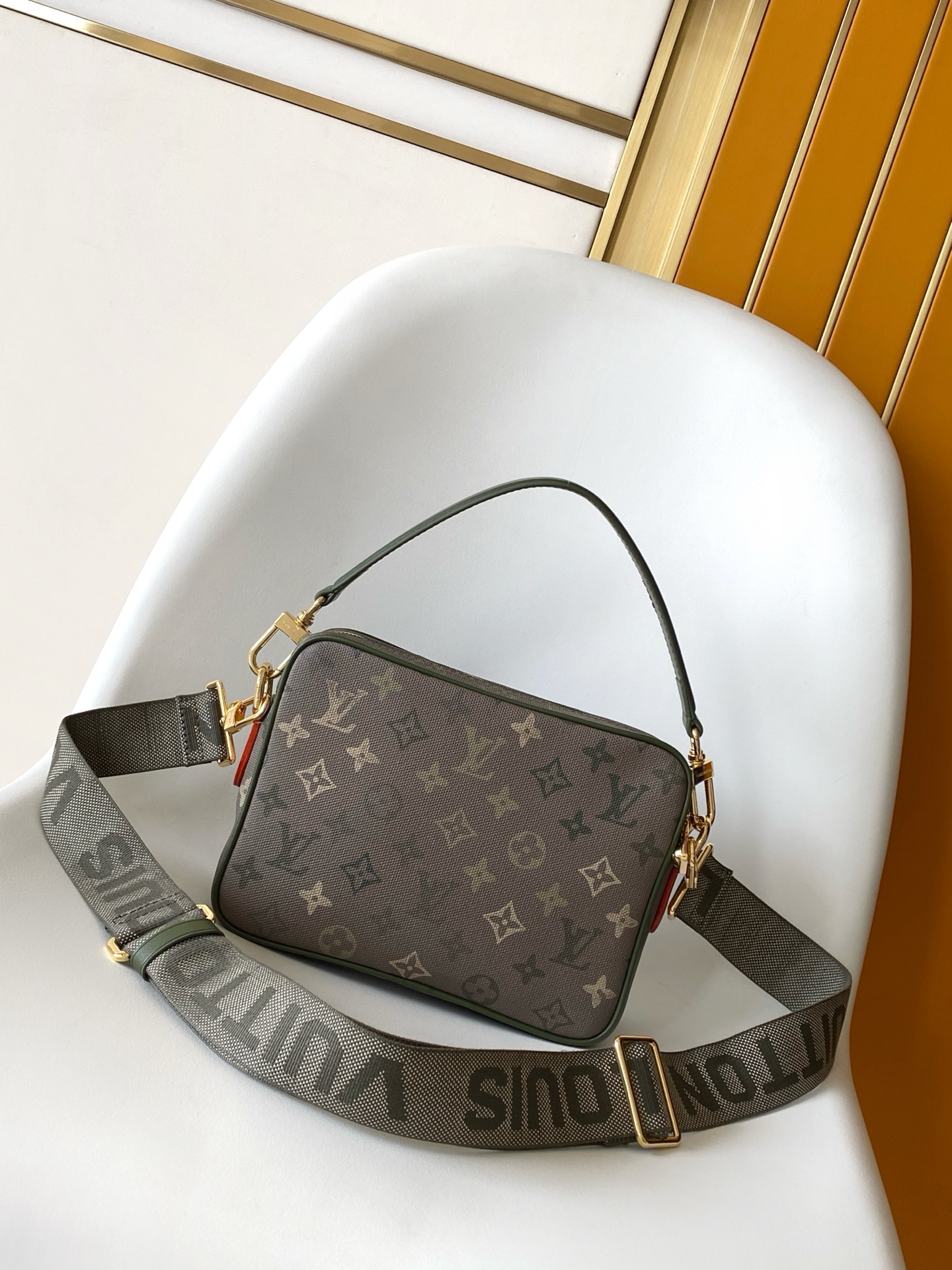 2 Louis Vuitton This Nil crossbody bag features a vintage silhouette crafted from Monogram Heritage canvas.