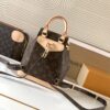 2 Louis Vuitton This Montsouris Mini features Monogram coated canvas with cowhide leather trim.