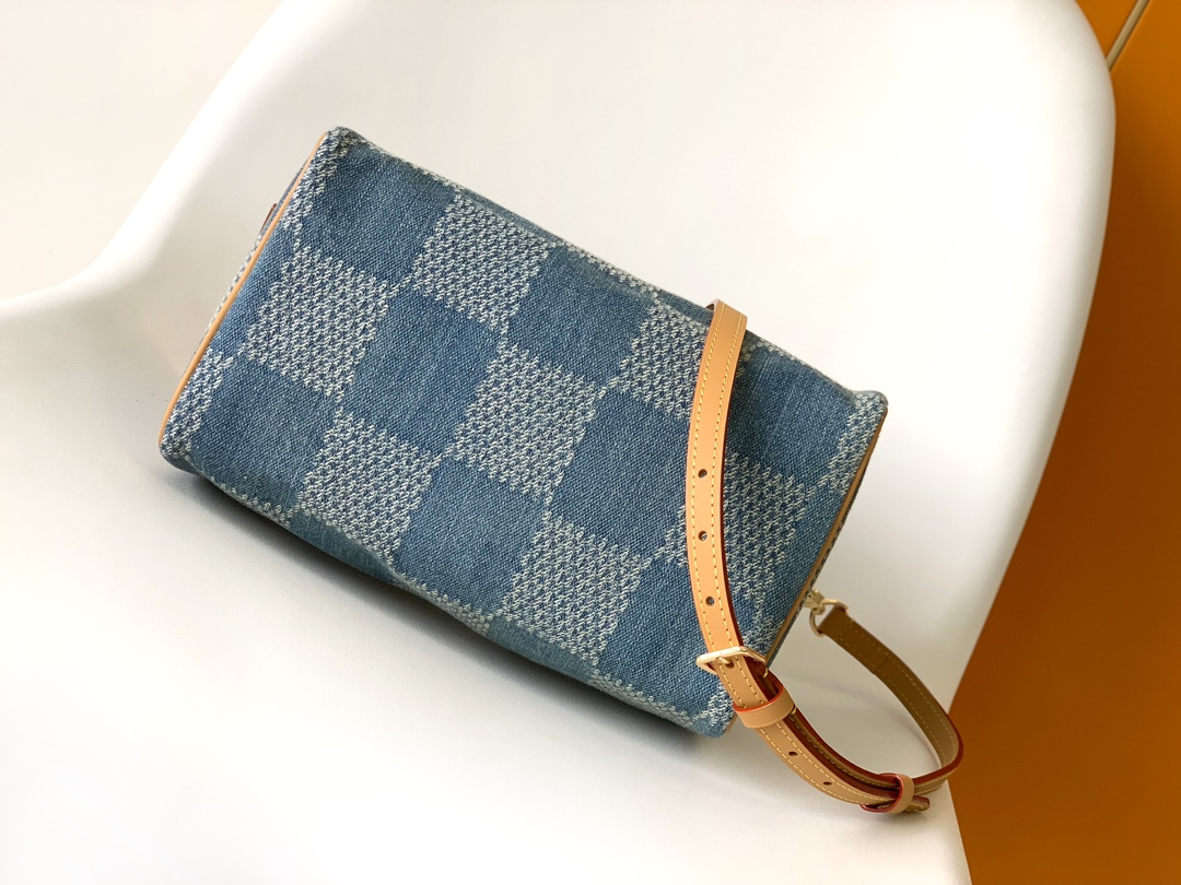 2 Louis Vuitton The new FW Denim Speedy 25 handbagâwhether worn crossbody...