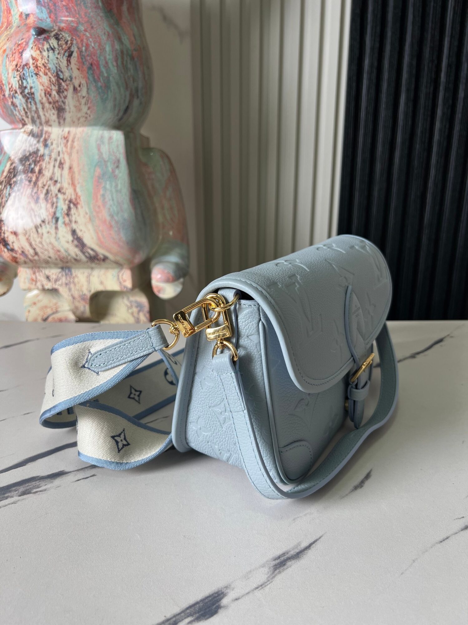2 Louis Vuitton This Diane handbag infuses Monogram Empreinte embossed leather with elegant tones.