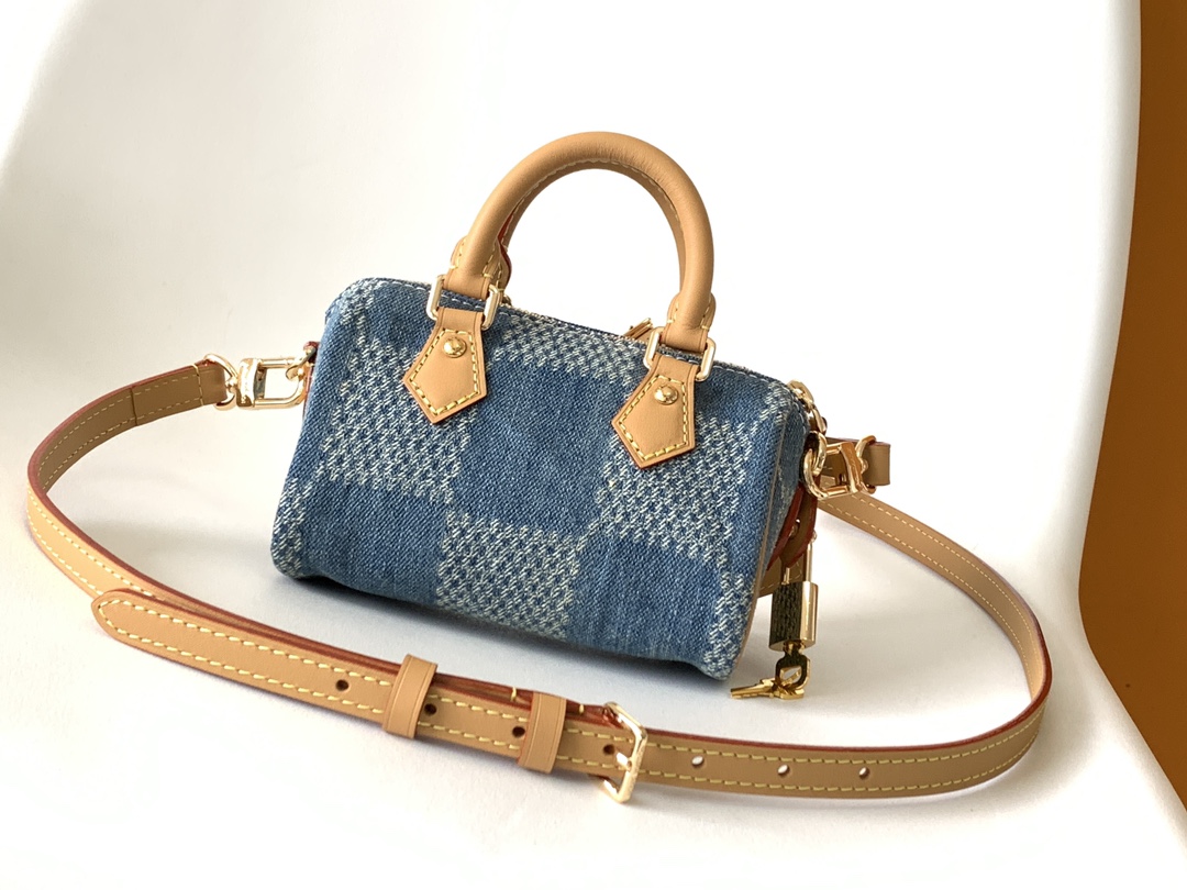 2 Louis Vuitton N40682 — FW New Denim Collection. The Sunset bag takes center stage in Monogram Denim canvas.