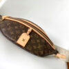 2 Louis Vuitton The M46784 High-Rise Bag is crafted from Montaigne-coated canvas.