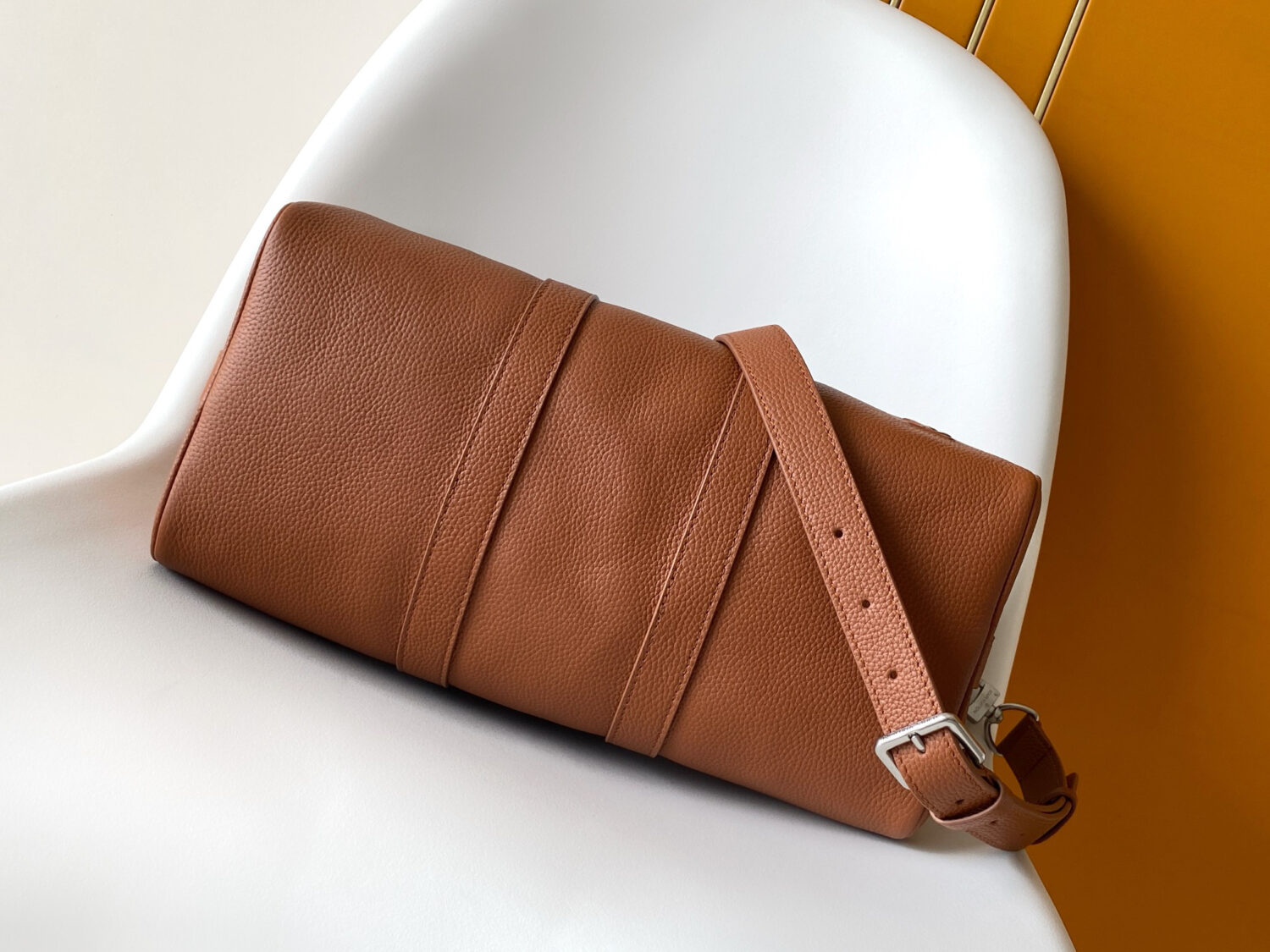 3 Louis Vuitton Keepall Bandoulière 35 Bag — This practical and versatile Keepall Bandoulière