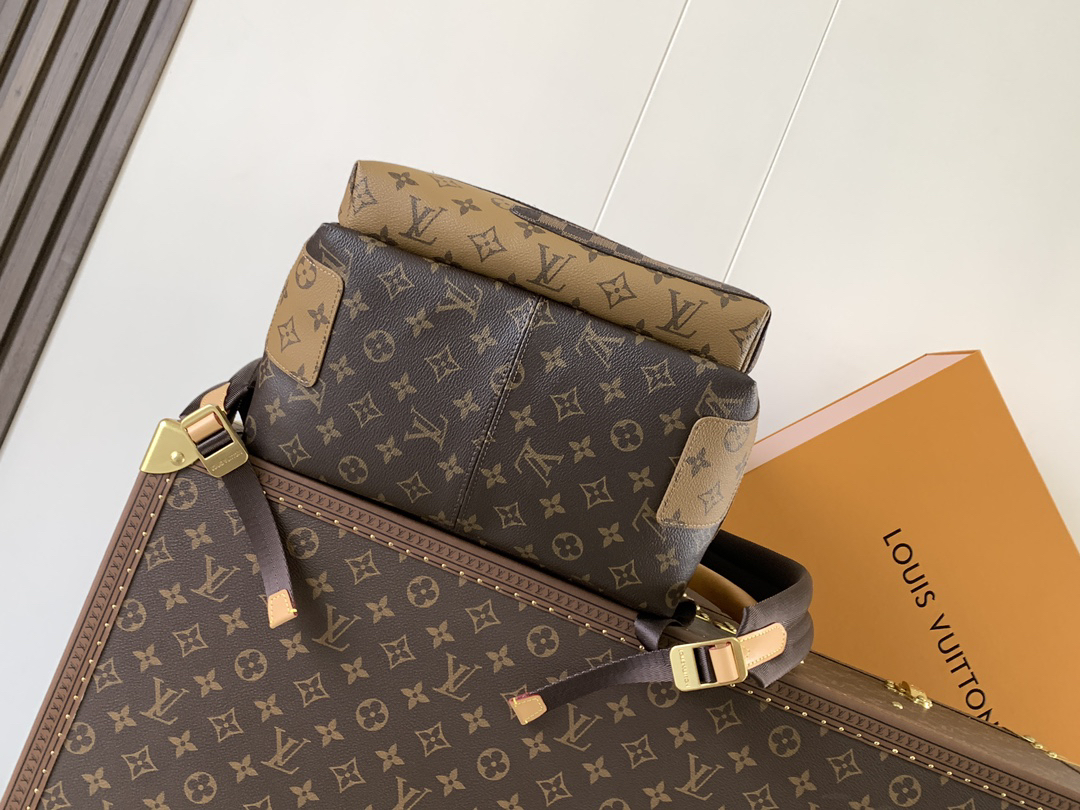 3 Louis Vuitton This Discovery Small Backpack features Monogram canvas accented with Monogram Reverse and Damier canvas patches.