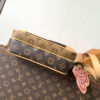 3 Louis Vuitton This Nil messenger bag features a Monogram canvas body accented with Damier and Monogram Reverse canvas patches, creating an elegant patchwork effect.