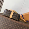 3 Louis Vuitton This Pochette Mia handbag, part of the Monogram collection, features a Monogram canvas body accented with cowhide leather trim.
