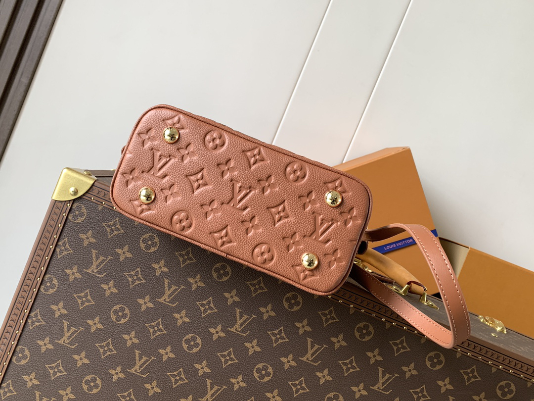 3 Louis Vuitton This Alma BB handbag showcases the iconic Alma BB silhouette, crafted from the House's exceptionally soft Monogram Empreinte leather.