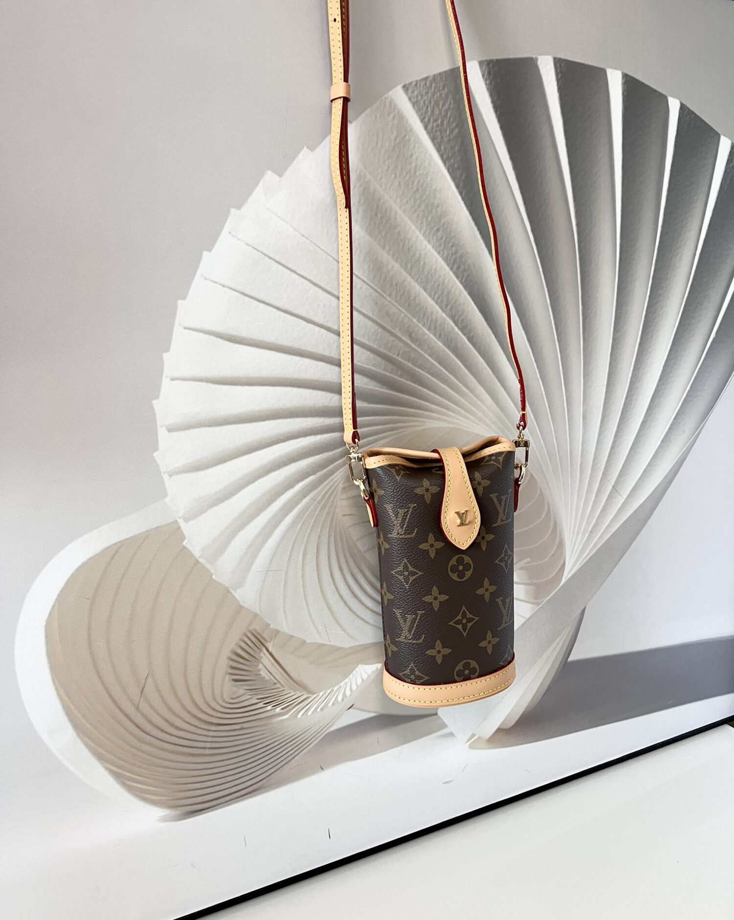 3 Louis Vuitton Mini Ice Cream Cone Bag — New "Fold Me" Mini Model, featuring a magnetic button closure design.