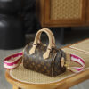Louis Vuitton The Speedy Bandoulière 20 carries the DNA of a century-old heritage, featuring an iconic, three-dimensional "pillow" silhouette that is both sleek and structured.