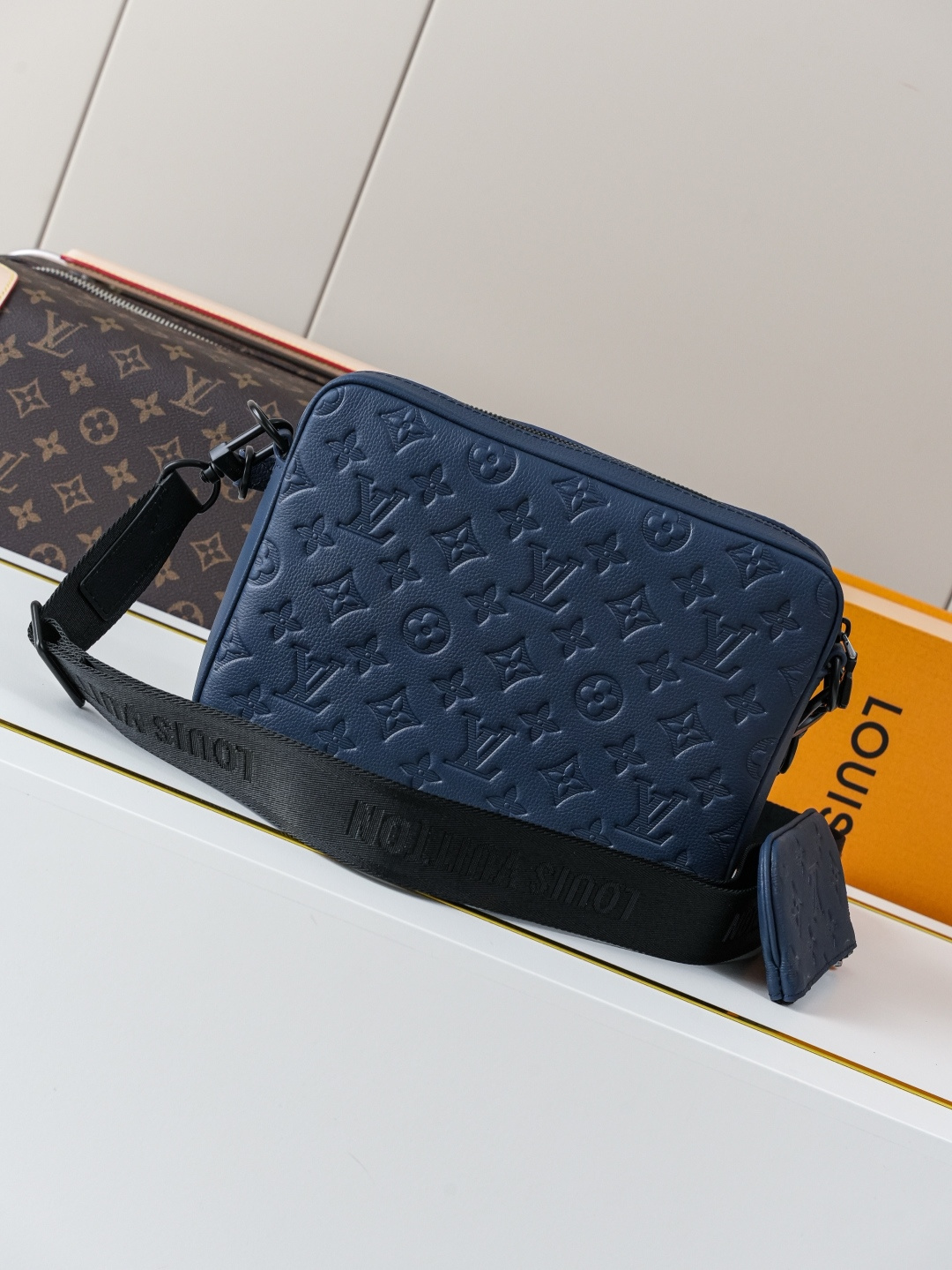 3 Louis Vuitton This Trio Messenger bag is crafted from soft Monogram Shadow calf leather.
