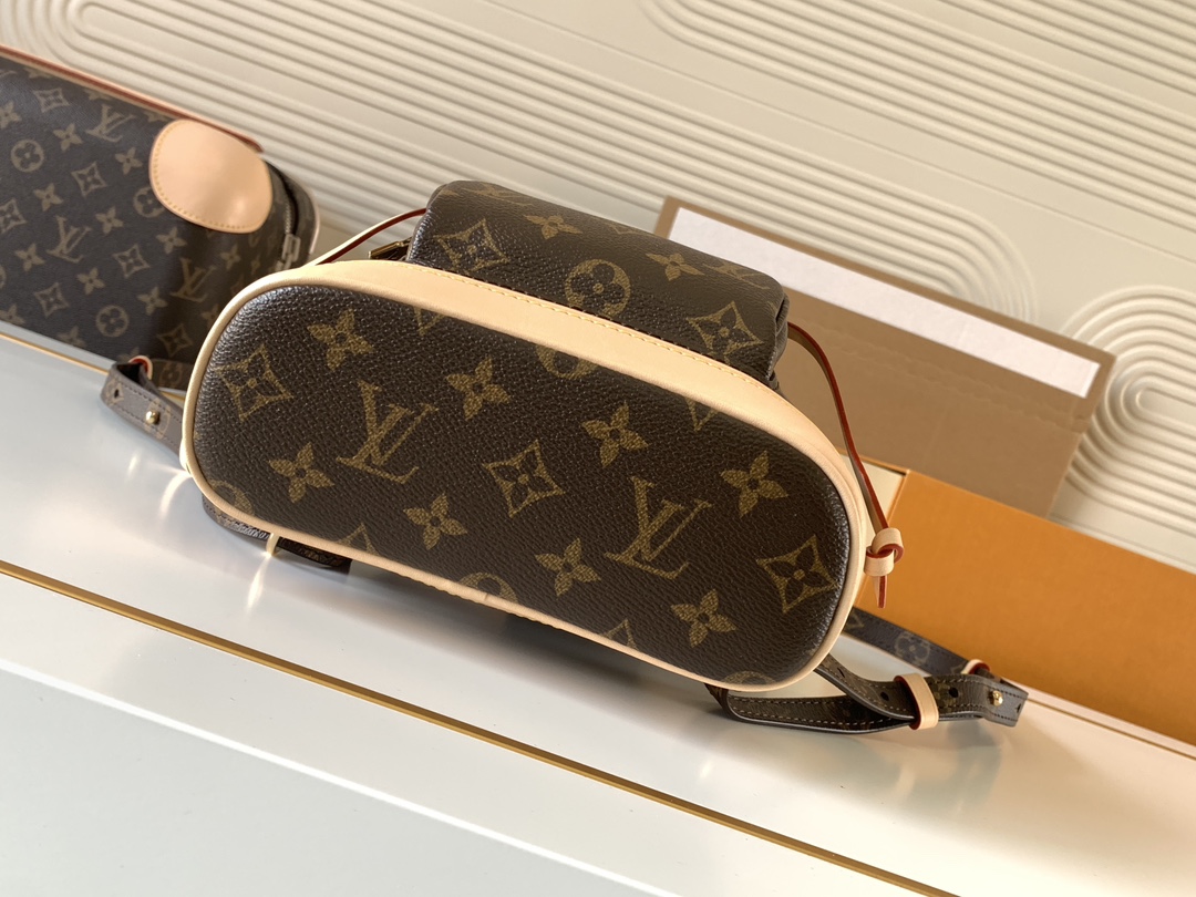 3 Louis Vuitton This Montsouris Mini features Monogram coated canvas with cowhide leather trim.