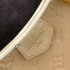 3 Louis Vuitton The Easy Pouch On Strap handbag from the Spring 2022 Collection is crafted from Monogram Empreinte leather.