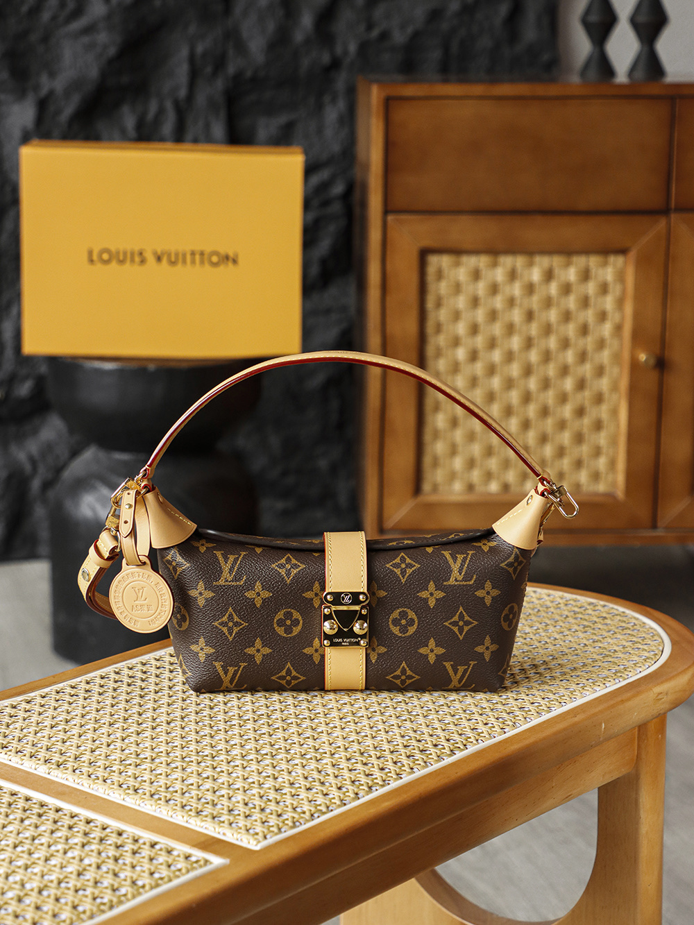 3 Louis Vuitton The Pochette Mia lunchbox bag delivers a stunning visual impact, exuding an air of vintage chic that is off the charts. Its magnetic S-lock clasp serves not only as a decorative accent but also as a symbol of exquisite craftsmanship and quality.