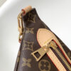 3 Louis Vuitton The M46784 High-Rise Bag is crafted from Montaigne-coated canvas.
