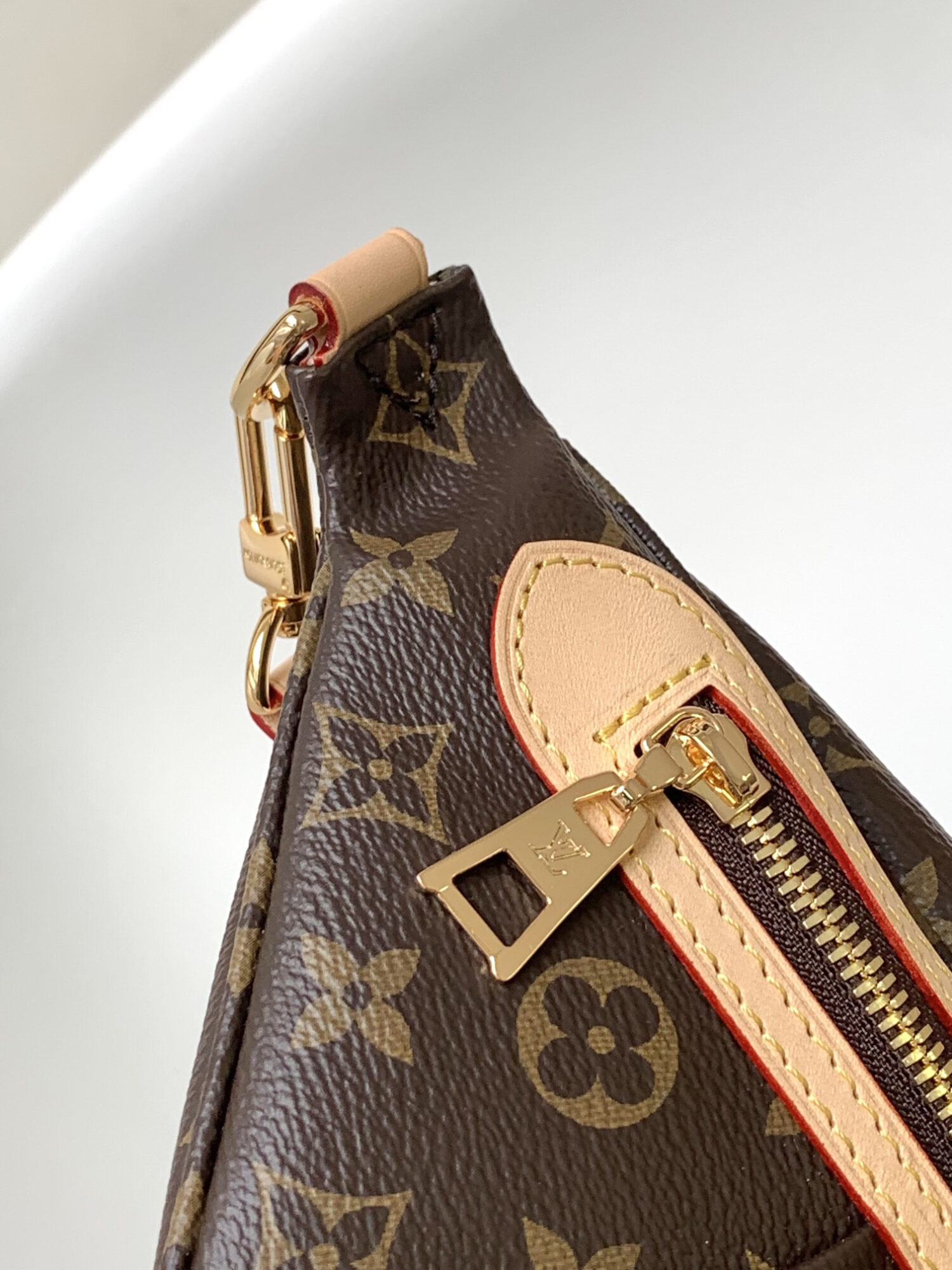 3 Louis Vuitton The M46784 High-Rise Bag is crafted from Montaigne-coated canvas.