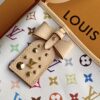 4 Louis Vuitton This Carryall East-West canvas handbag illuminates this classic element with a vibrant splash of color.