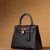 4 Hermes Kelly bag, black, 25cm, with gold hardware.