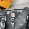 4 Louis Vuitton The Keepall 50 travel bag, crafted from the new, iconic black and grey Monogram Eclipse canvas.