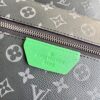 Louis Vuitton This small Discovery backpack features a patchwork of Monogram Eclipse canvas and vibrant cowhide leather.