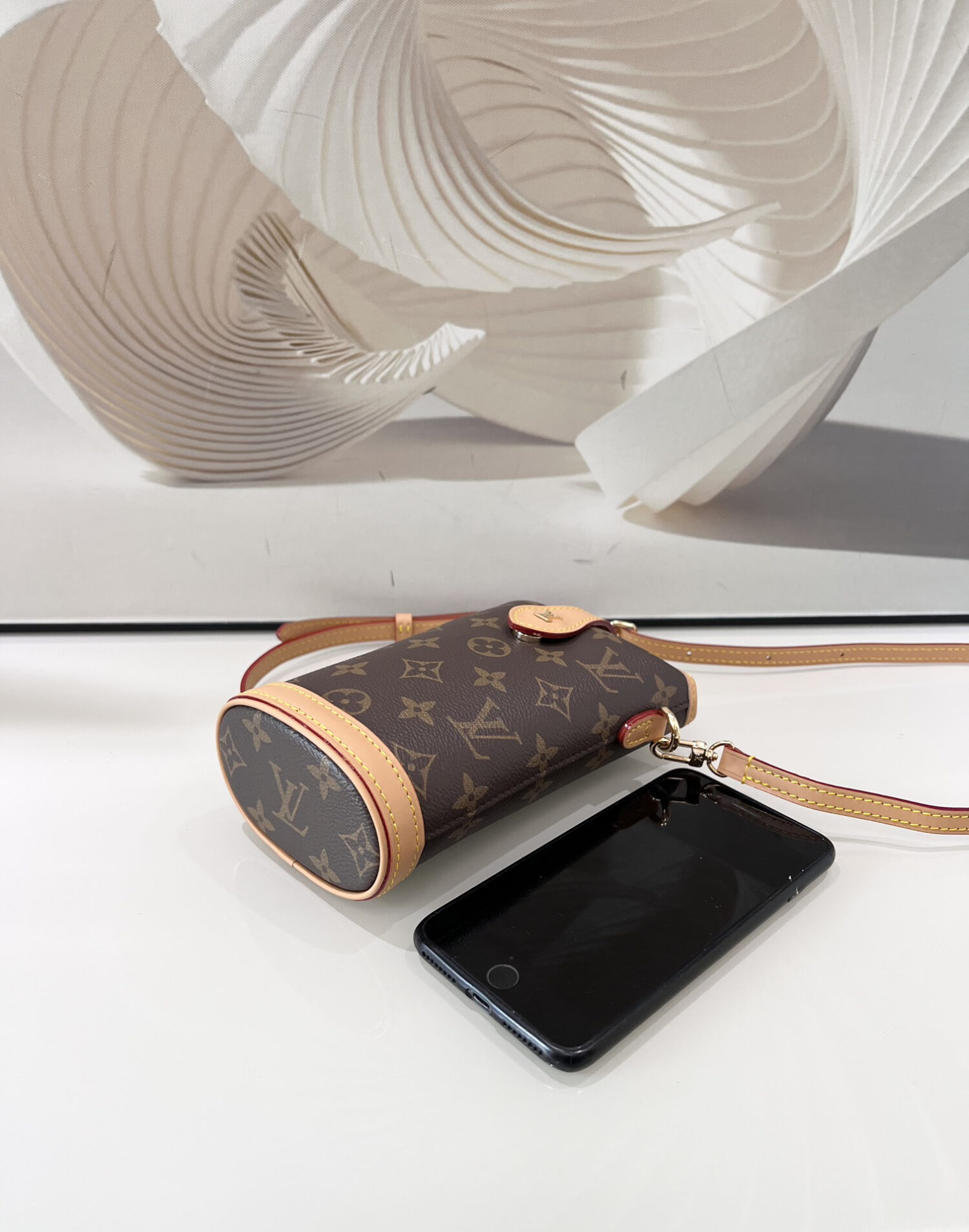 4 Louis Vuitton Mini Ice Cream Cone Bag — New "Fold Me" Mini Model, featuring a magnetic button closure design.