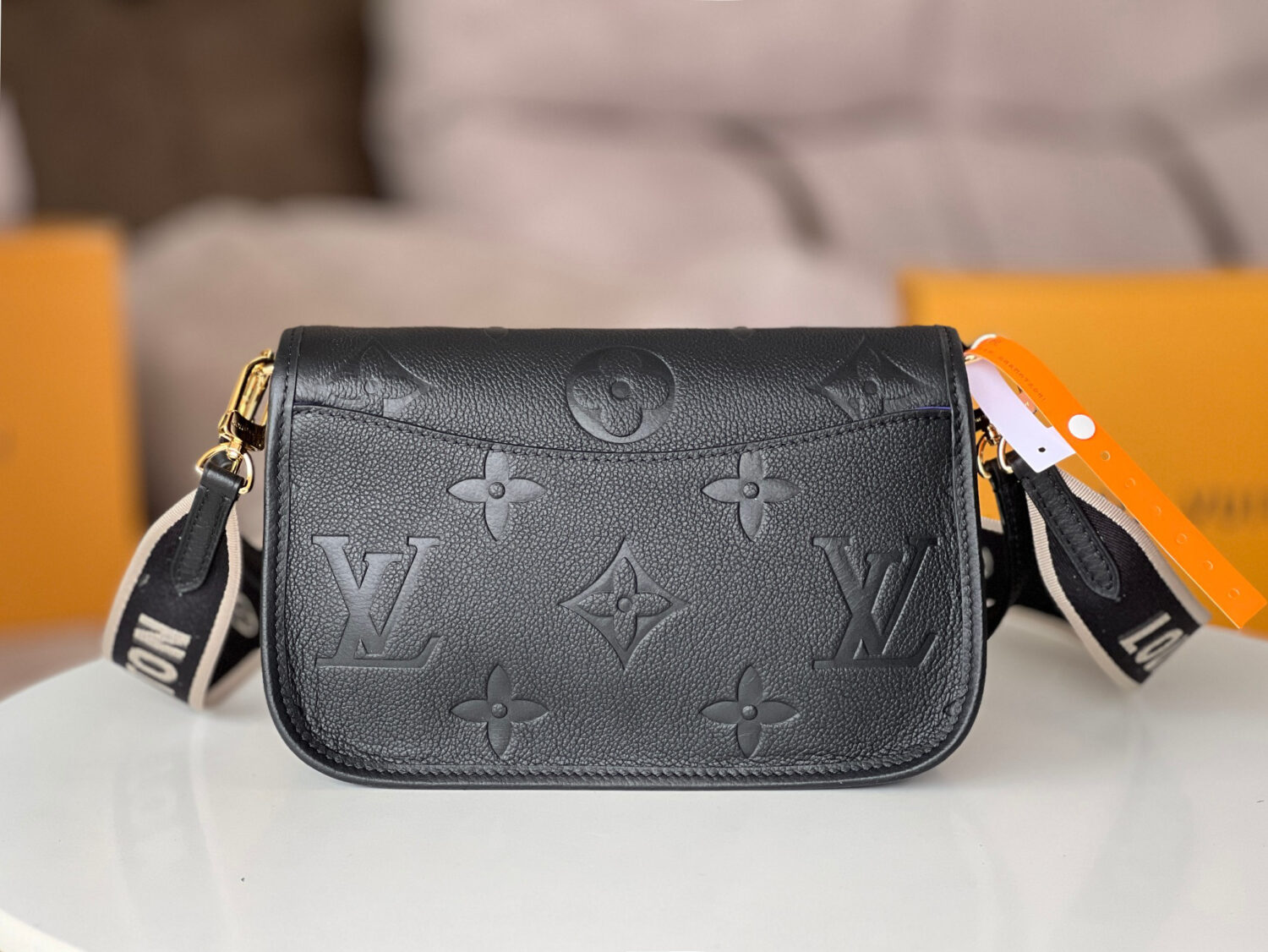 4 Louis Vuitton This Diane handbag is crafted from Louis Vuitton's classic Monogram Empreinte embossed leather.