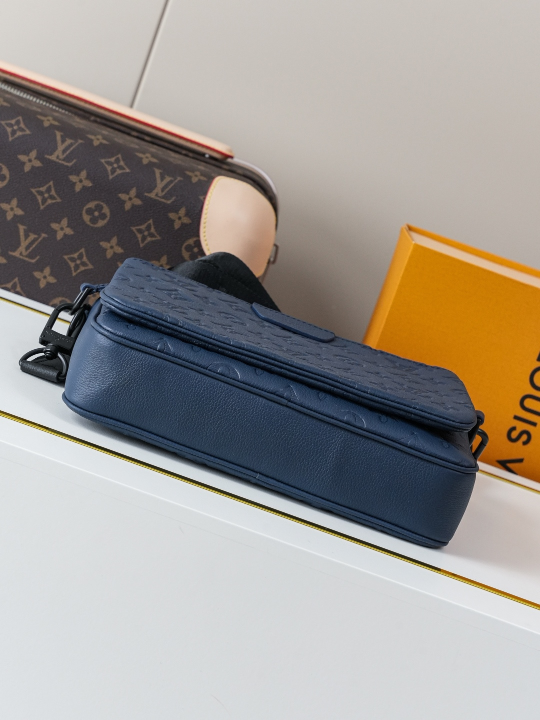 4 Louis Vuitton This Trio Messenger bag is crafted from soft Monogram Shadow calf leather.