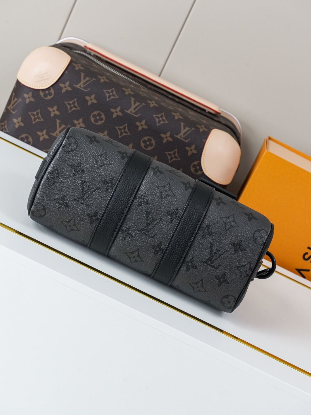 4 Louis Vuitton This Keell Bandoulière 25 handbag features Monogram Midnight coated canvas accented with a deep Monogram print.