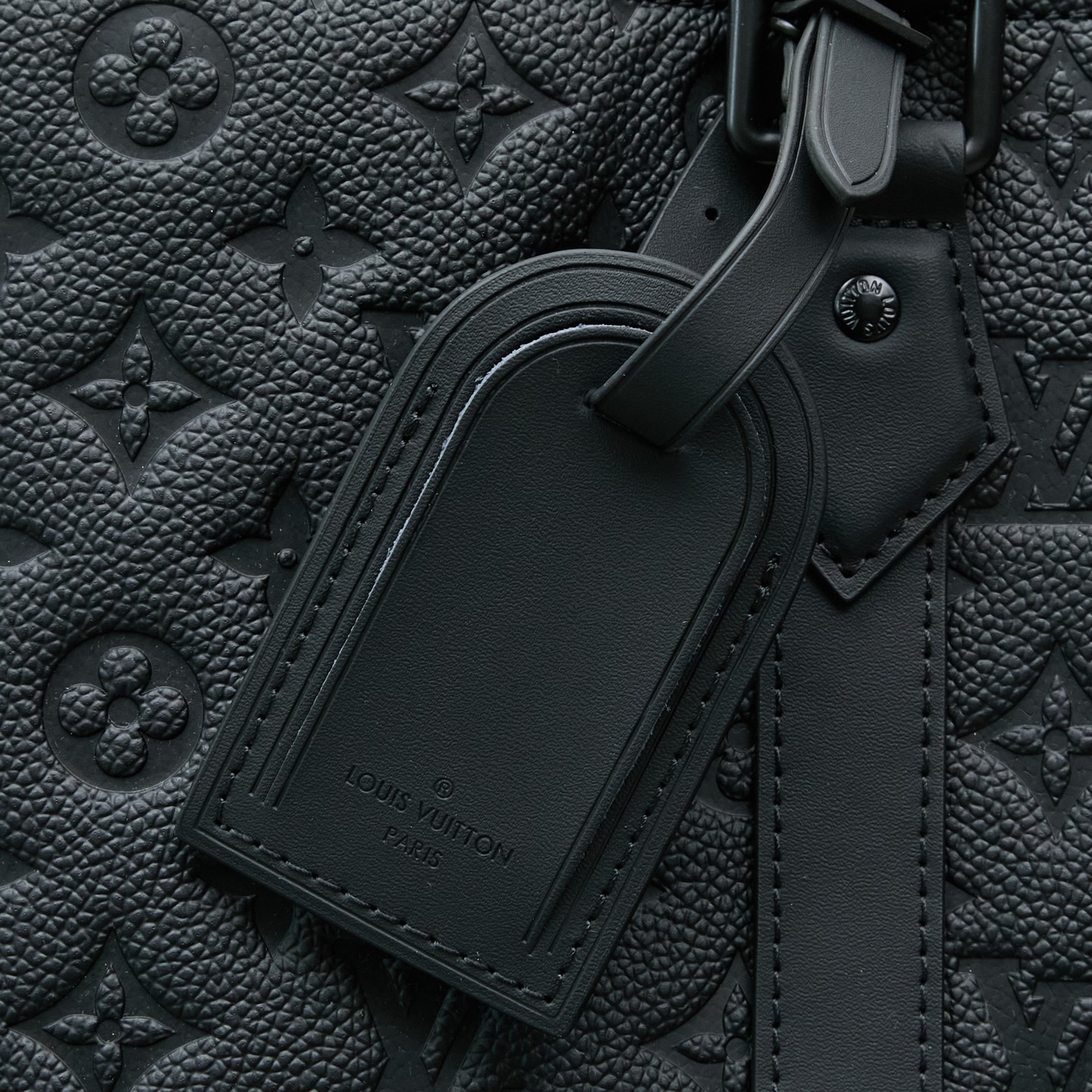 4 Louis Vuitton This Sac Plat 24H bag is crafted from Monogram-embossed Taurillon leather.