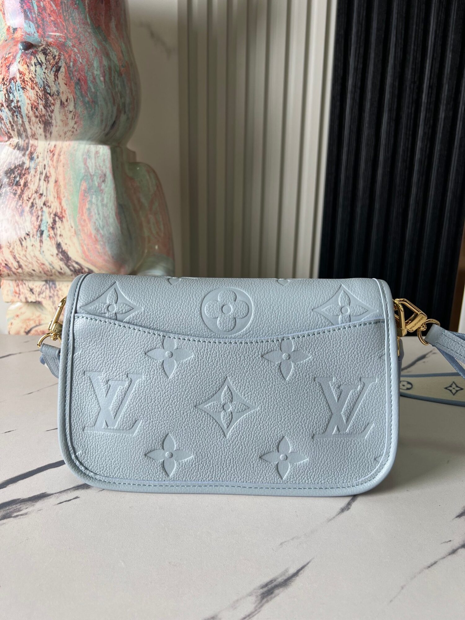 4 Louis Vuitton This Diane handbag infuses Monogram Empreinte embossed leather with elegant tones.