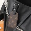 4 Louis Vuitton This small CarryAll Cargo handbag is crafted from soft lambskin, featuring a stylishly micro-crinkled finish.