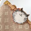 5 Louis Vuitton This "LV Travels With" edition of the large Side Trunk handbag showcases the brand's collaboration with a fashion icon and artist.