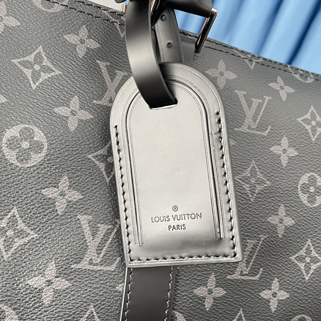 5 Louis Vuitton The Keepall 50 travel bag, crafted from the new, iconic black and grey Monogram Eclipse canvas.