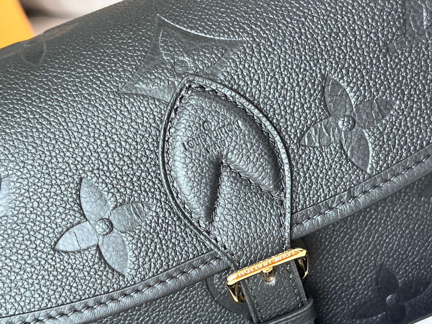 5 Louis Vuitton This Diane handbag is crafted from Louis Vuitton's classic Monogram Empreinte embossed leather.