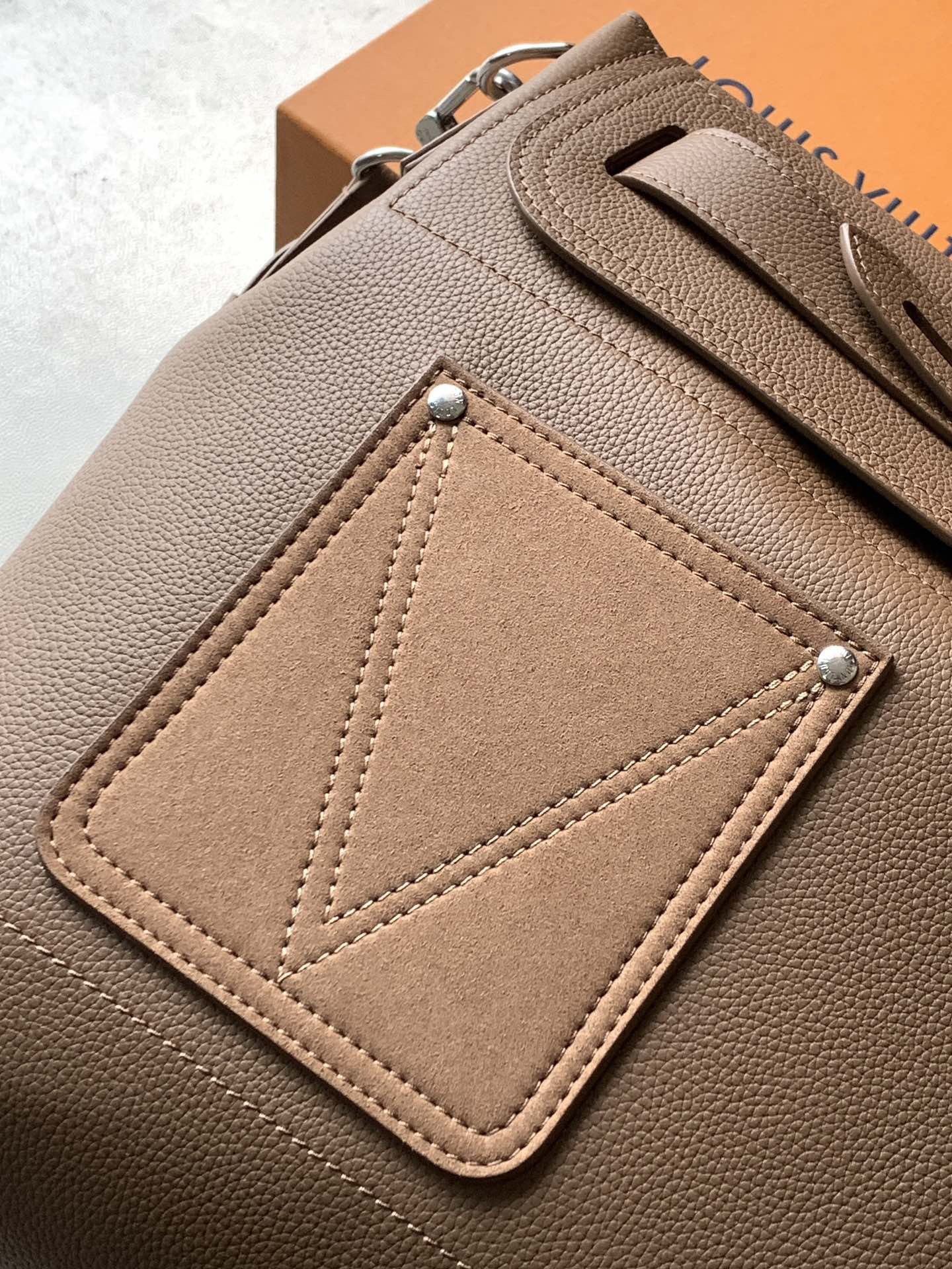 5 Louis Vuitton This Steamer 30 bag reimagines the century-old classic Steamer—a style that has remained popular for a hundred years—in LV Touch cowhide.