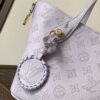 5 Louis Vuitton This small Blossom handbag is steeped in the modern hues of the new season.